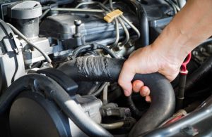 A person working on preventative maintenance of a vehicle near Indianapolis, Indiana.