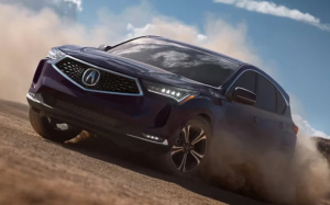 A 2024 Acura RDX driving on a dirt road near Indianapolis, Indiana