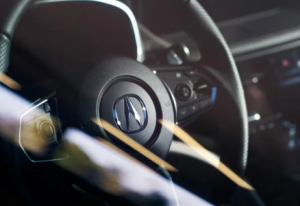 The steering wheel of a 2024 Acura MDX taken near Indianapolis, Indiana